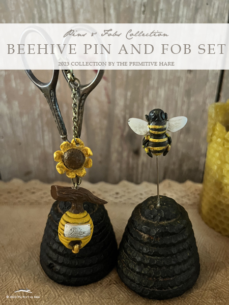 Beehive and bee pin